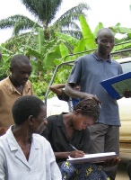 Lamech, the extension worker, trains buck-keepers in record keeping