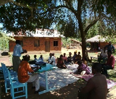 Training a farmers group in Masaka District